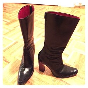 Black patent leather high heal boots