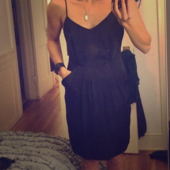 Black cocktail dress with pockets