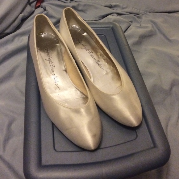 White satin flats.
