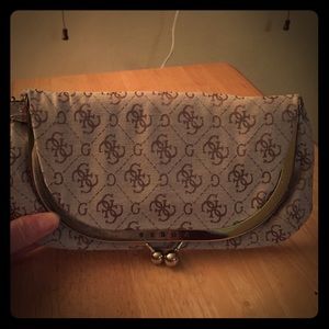 Medium size guess clutch used