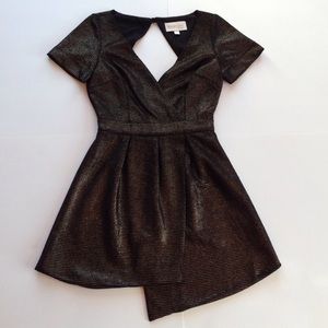 Gold and black asymmetrical hemline dress