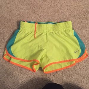 neon Nike running shorts