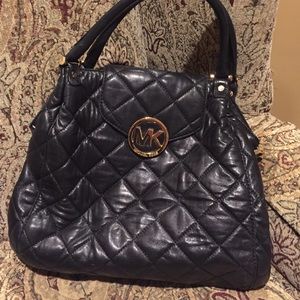 MK quilted leather sachtel