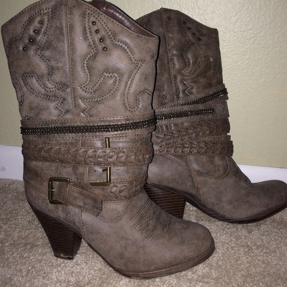Grey boots with leather straps