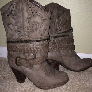 Grey boots with leather straps