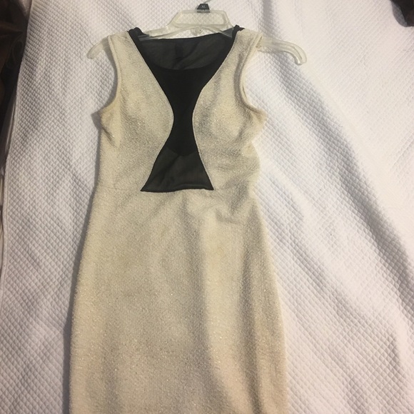 Beige w/ little of gold dress. Used.