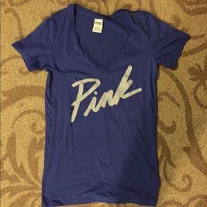 Pink tshirt with sparkle writing.