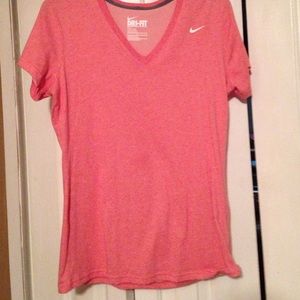 Nike dry fit shirt size large color is a peachish