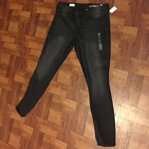 Unworn because they don't fit.