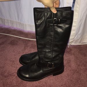 Tall black leather boots