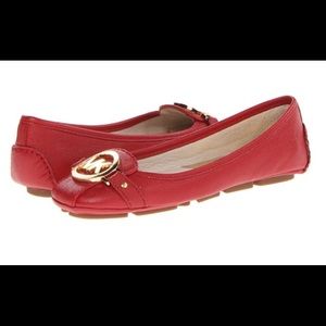 Red pair of Michael kors flats