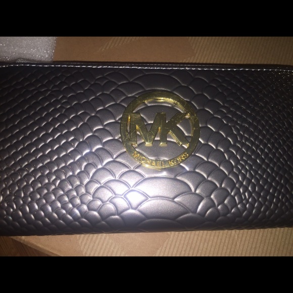 Cute silver/grey MK wallet!
