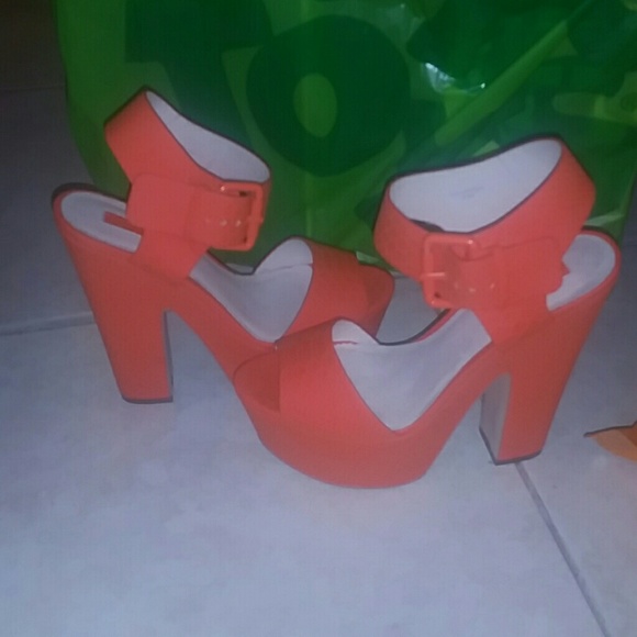 Orange strappy shoe with chunky heel