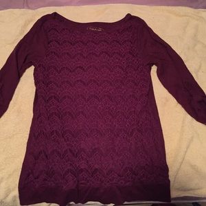 Maurice's maroon shirt