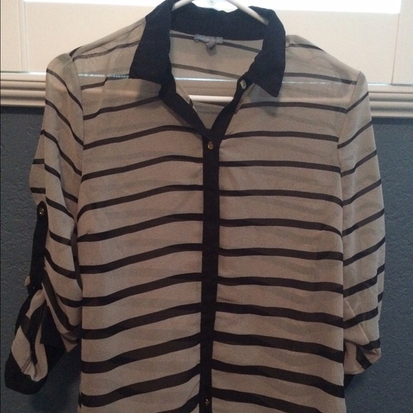 Beige and black button up.