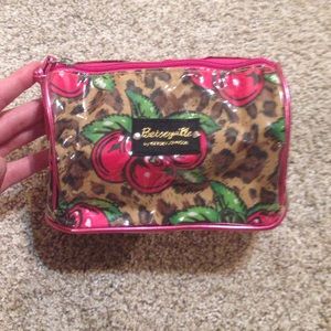 Betseyville cheetah and cherry print makeup bag.