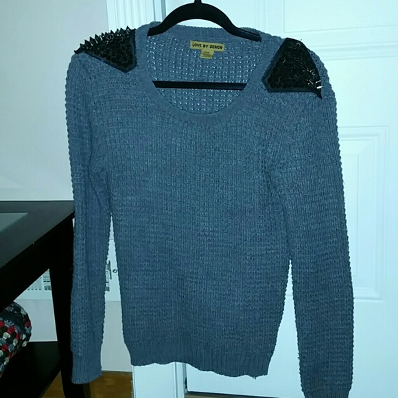 Spike shoulder accent sweater