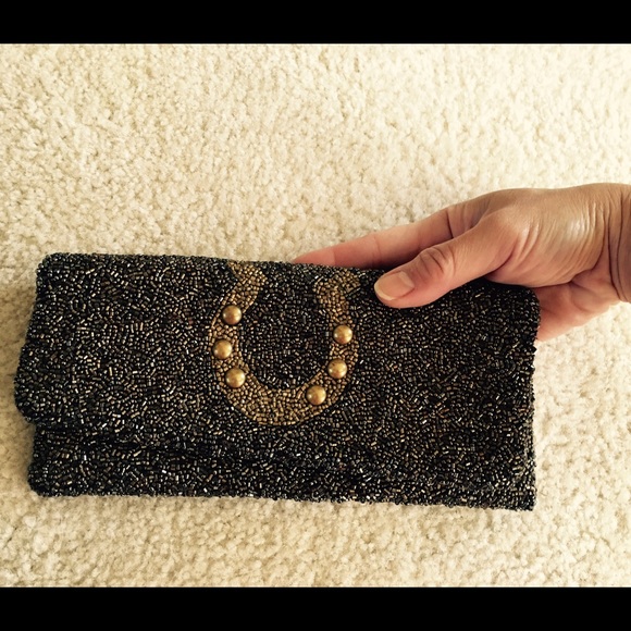 Moyna lucky charm clutch