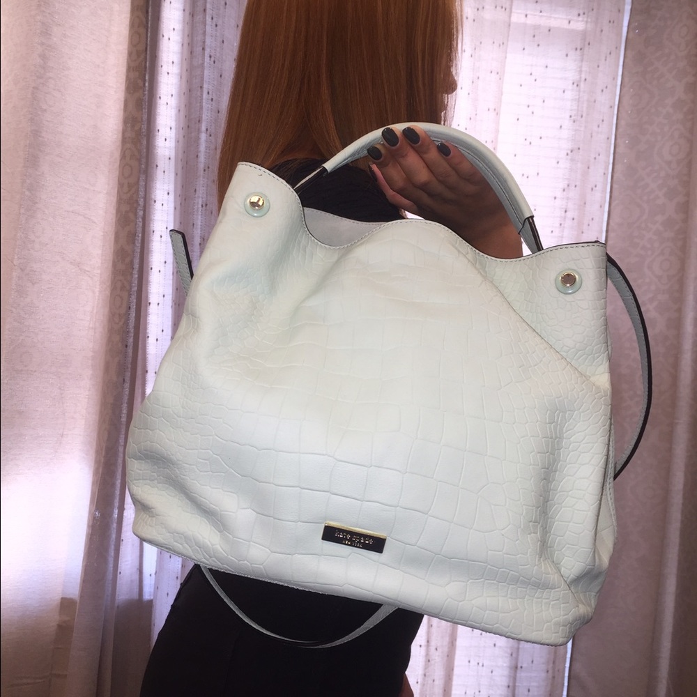 Authentic Kate Spade, new condition.