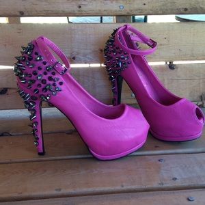 Pink peep toe spiked heels