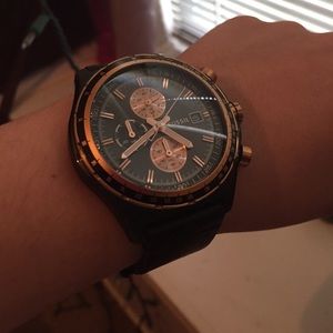 Fossil men's black leather watch with rose gold.