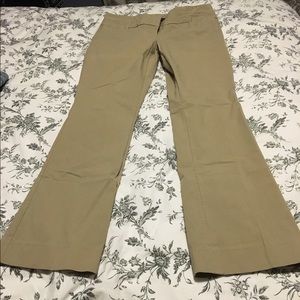 The limited tan exact stretch pants