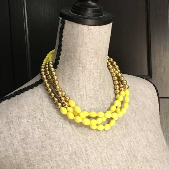 Necklace. 3rows yellow and gold beads.