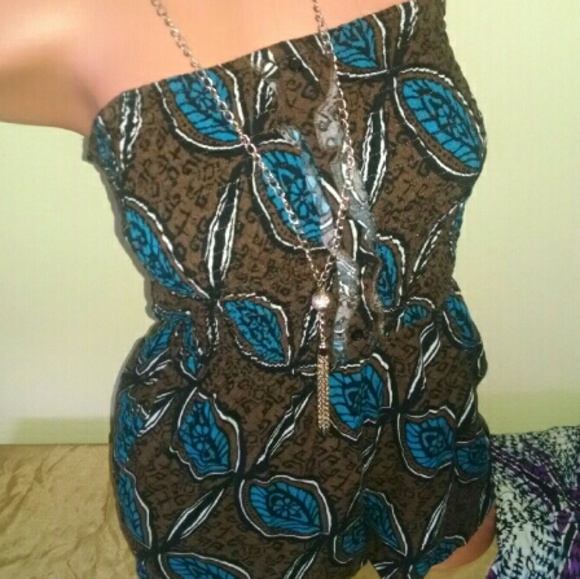 2 Rompers both size Medium