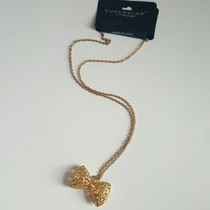 Laser cut gold bow necklace