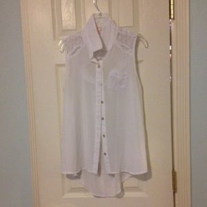 White sleeveless blouse