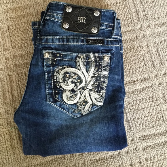 Miss Me size 26 dark wash jeans.
