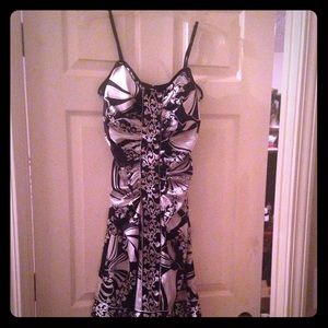 A floral black and white short dress , fitted