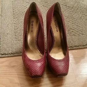 Bebe snake leather print pumps