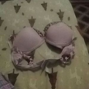 Pink bra with cheetah prints on it.