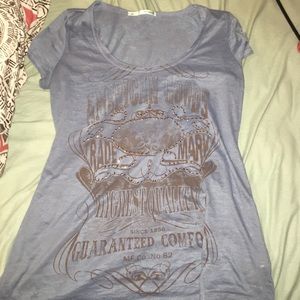 Maurice's burnout blue tee with studs