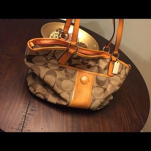 Coach purse orange and camel.