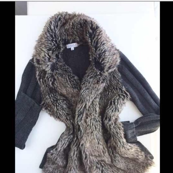 Faux fur with knitted sleeves and back.