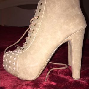 Pair of spiked ankle boots