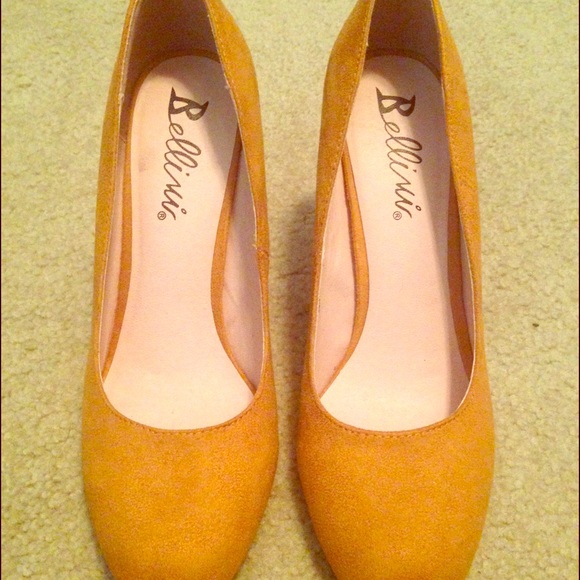EUC mustard yellow colored pumps. (Worn once!)