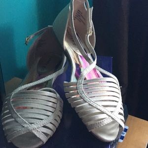 Cream sandals, new never worn size is to big.