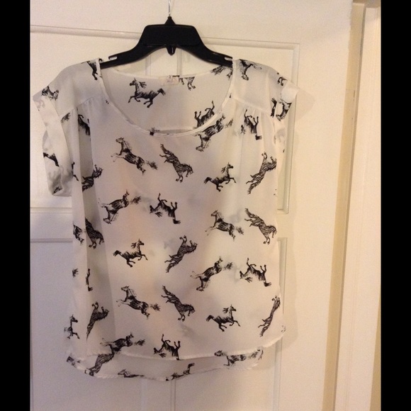 Horse print blouse.