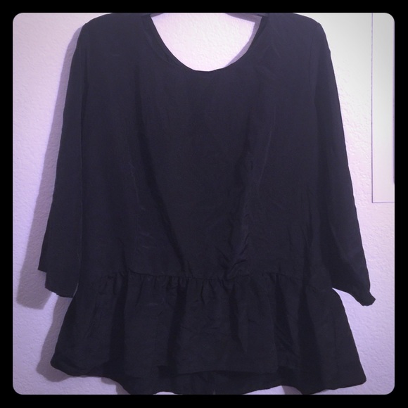 Beautifully crafted peplum top!