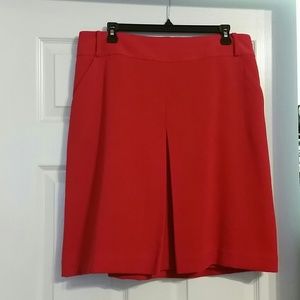 Red front pleat skirt