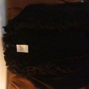 RUFFLED SWEATER VEST.