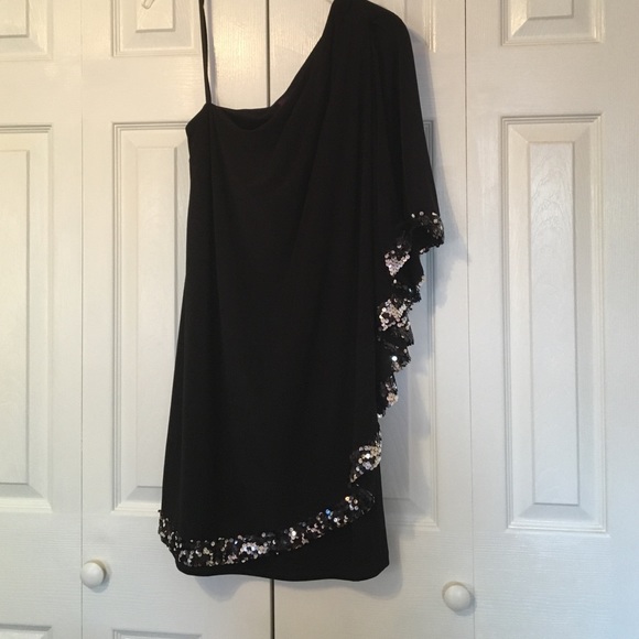 One shouldered, black sequined cocktail dress.