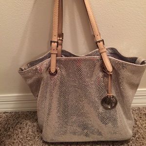 Authentic MK silver tote. 12"W •11"L •6"D