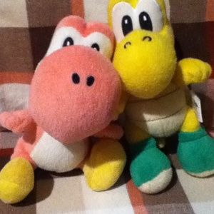 A pink yoshi and a koopa