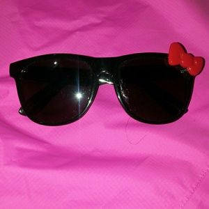 Black Hello Kitty sunglasses w/ a red bow on side