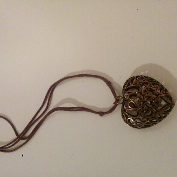 Heart cage necklace