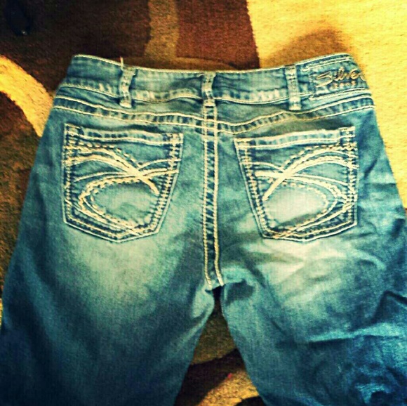 Silver jeans. Worn.